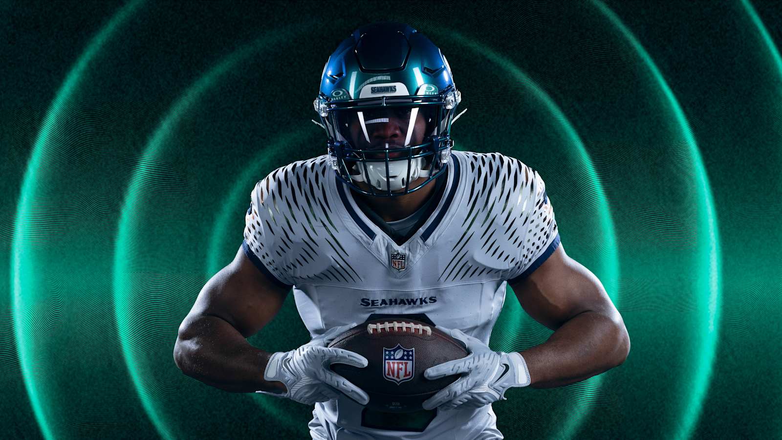 Seattle Seahawks Rivalries uniform on Kenneth Walker III, a white and wolf grey jersey with a soundwave pattern radiating across the shoulders, navy trim, and an iridescent green helmet with a chrome hawk logo