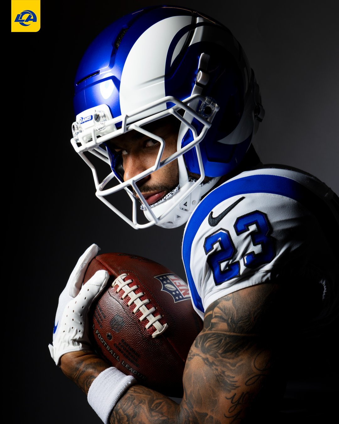 Los Angeles Rams Fearsome White helmet closeup showing white horns, white facemask and black-outlined royal blue numbers
