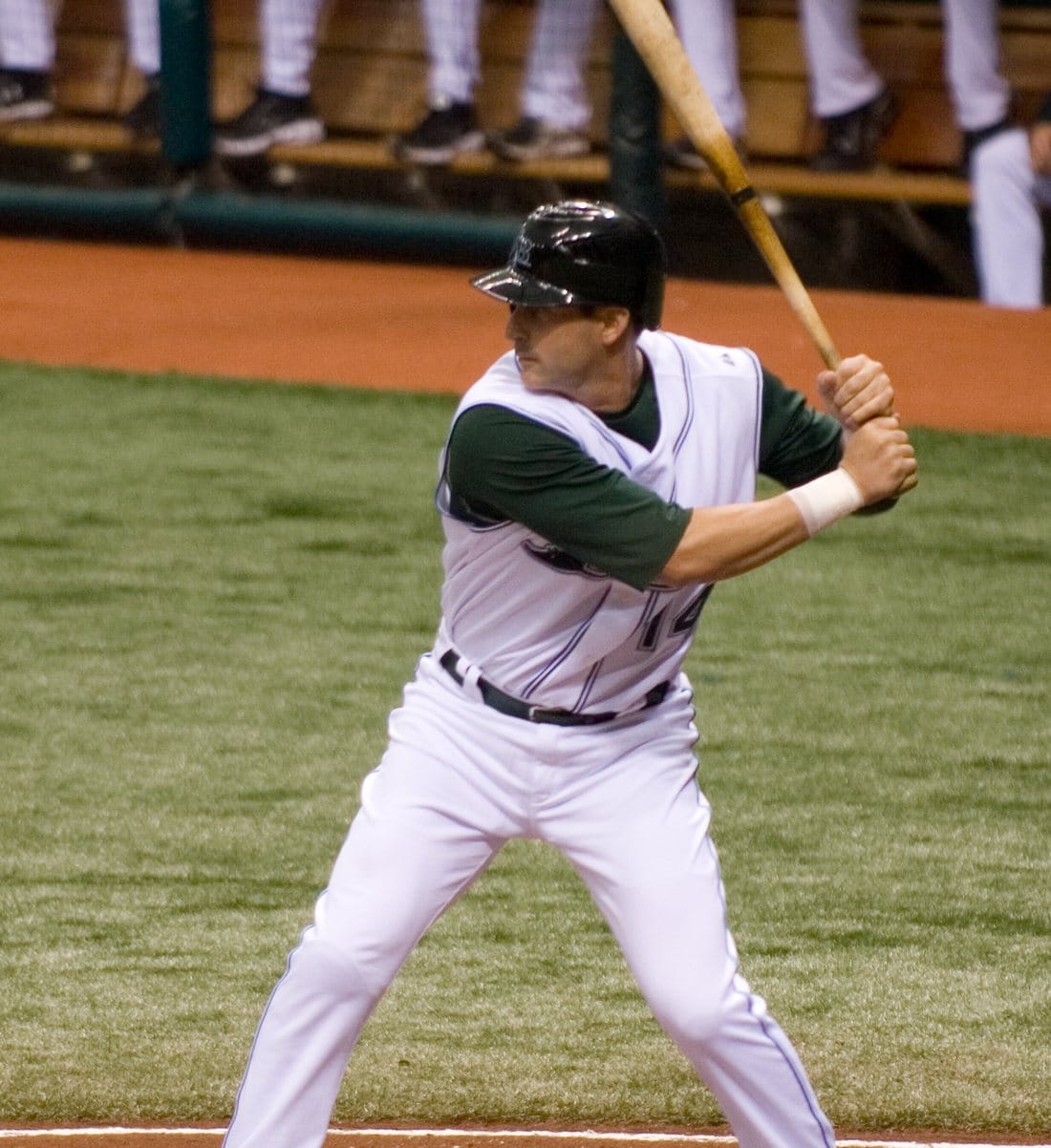 Greg Norton batting for the Tampa Bay Devil Rays in 2007 in a white sleeveless jersey with green undershirt and black helmet
