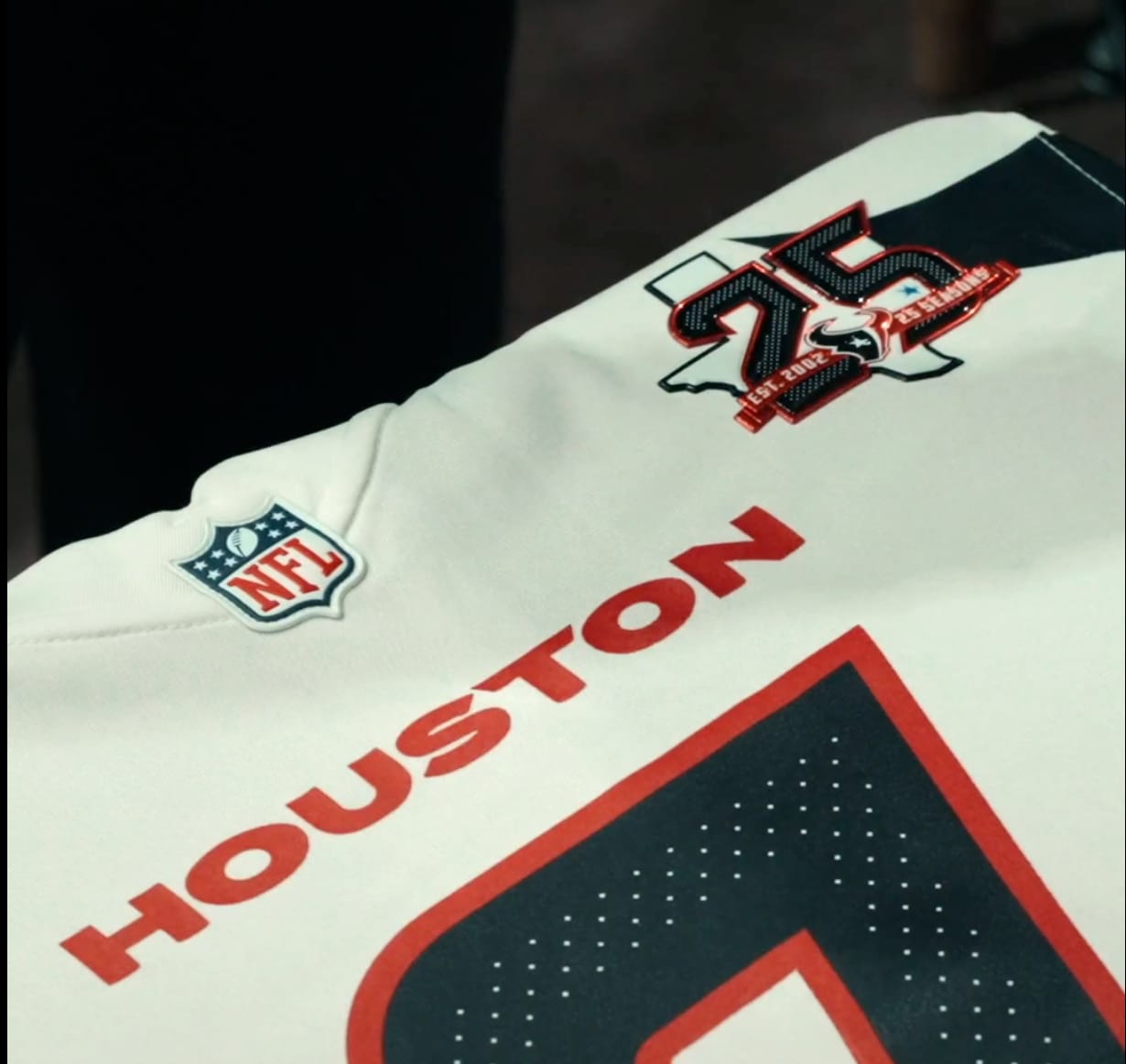 Houston Texans 25th anniversary patch on the red 2026 jersey shoulder