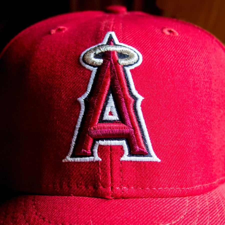 The Los Angeles Angels red cap with the halo A logo designed by Todd Radom