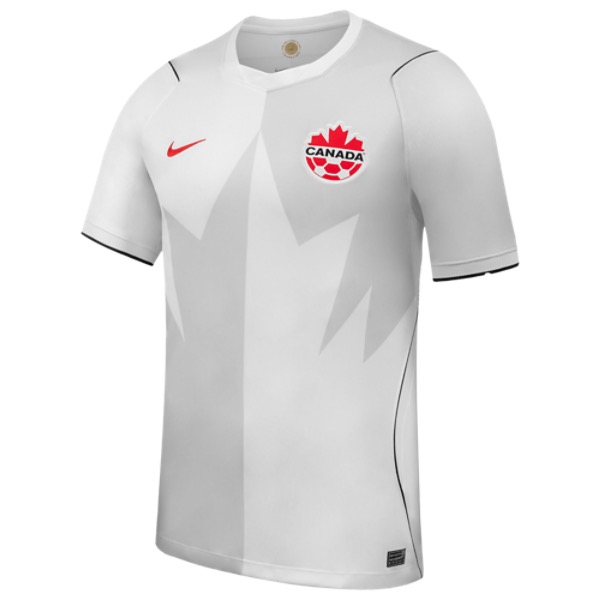 Canada 2026 World Cup Nike white away jersey with a tonal maple-leaf chevron pattern, red Nike swoosh, and the Canada Soccer crest, worn in the Group B match vs Switzerland