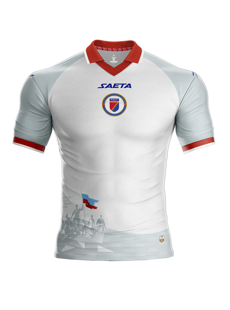 Haiti 2026 World Cup white SAETA home jersey with a red collar and a tonal grey heritage graphic, worn in the Group C match vs Brazil