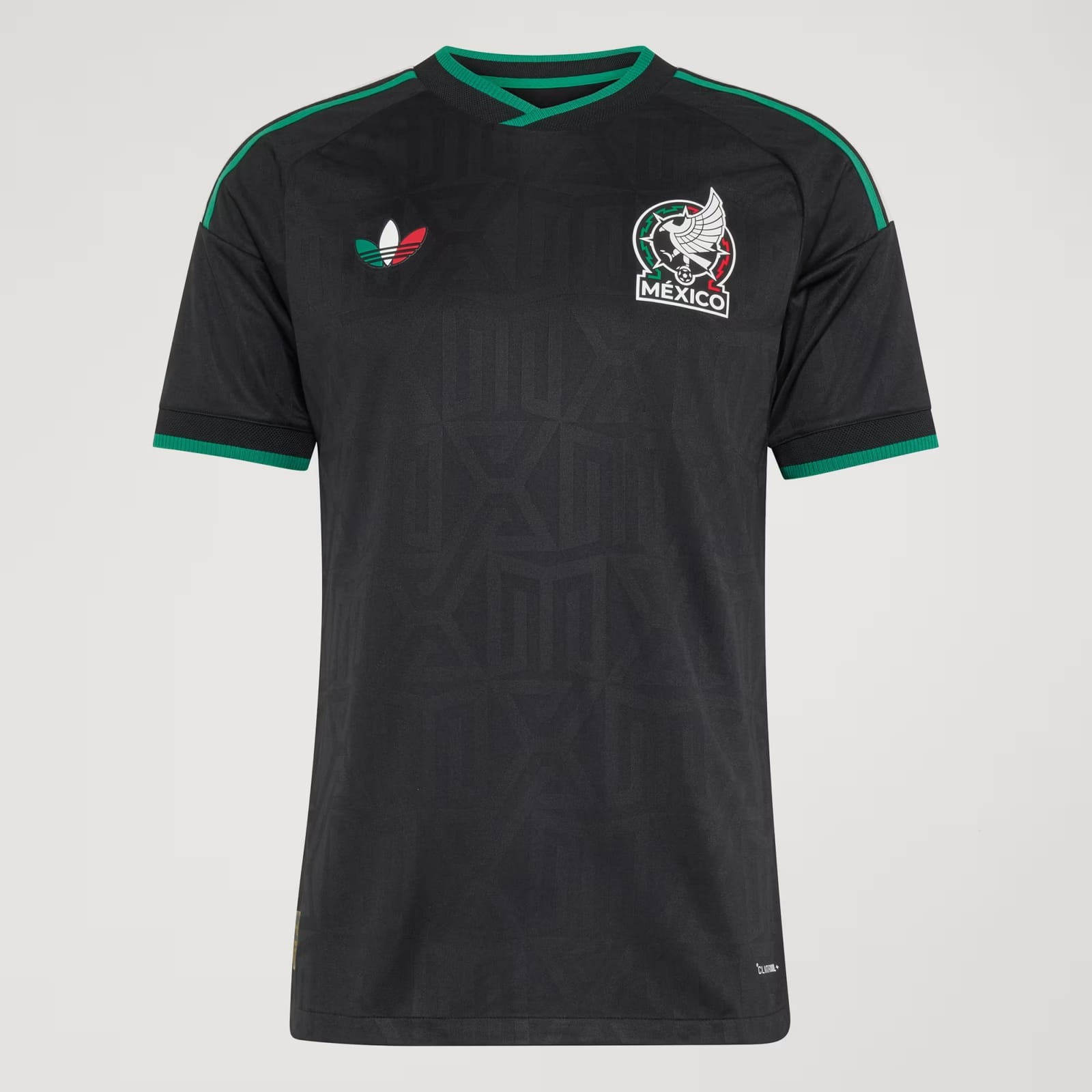 Mexico 2026 World Cup black adidas change jersey with a tonal Aztec-pattern print, green collar and cuffs, and the green-and-red eagle crest, worn in the Group A match vs South Korea
