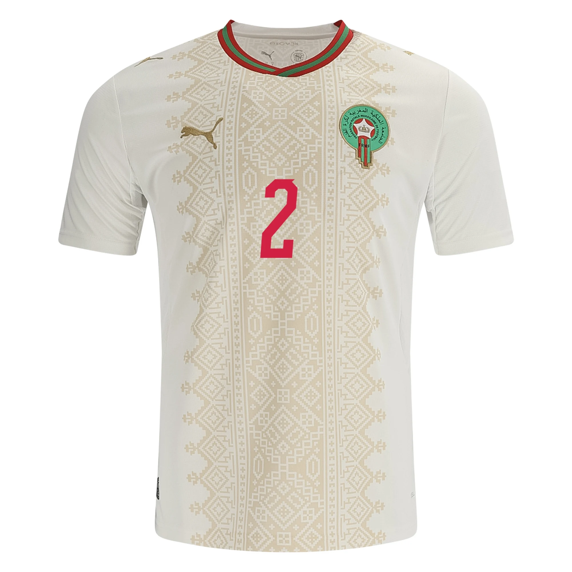 Morocco 2026 World Cup white Puma away jersey with a gold zellige pattern and red and green collar trim, worn in the Round of 32 vs the Netherlands