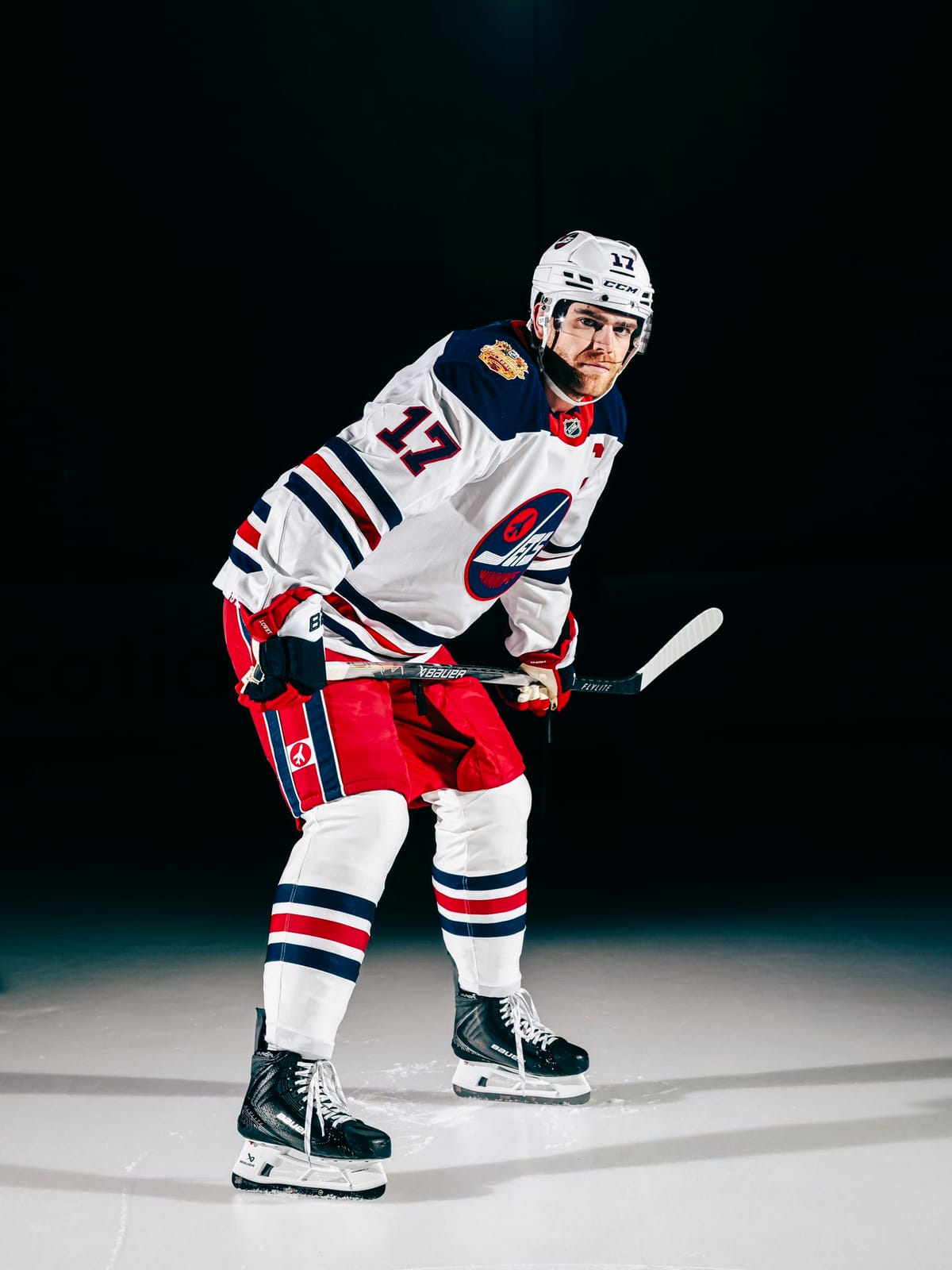 Full Winnipeg Jets 2026 Heritage Classic uniform: white sweater, red pants and striped socks