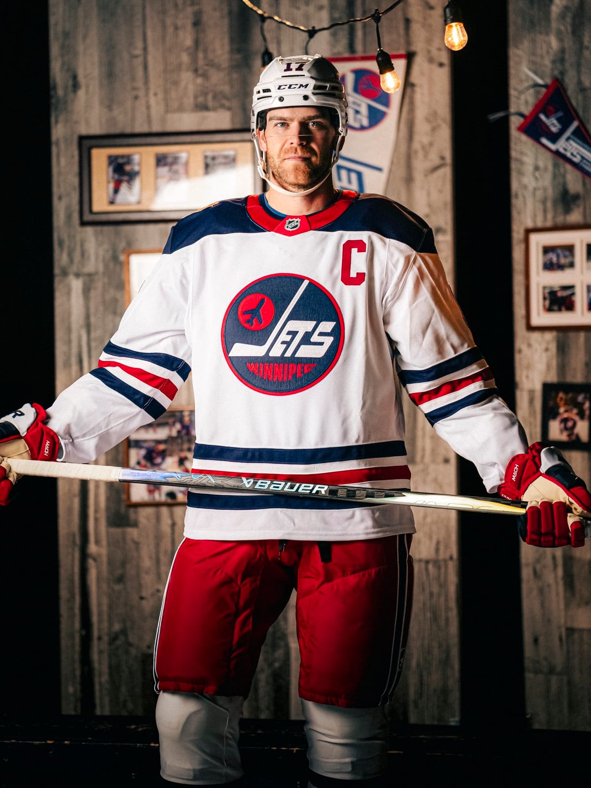 Winnipeg Jets 2026 Heritage Classic white jersey with the vintage round Jets crest and navy and red stripes