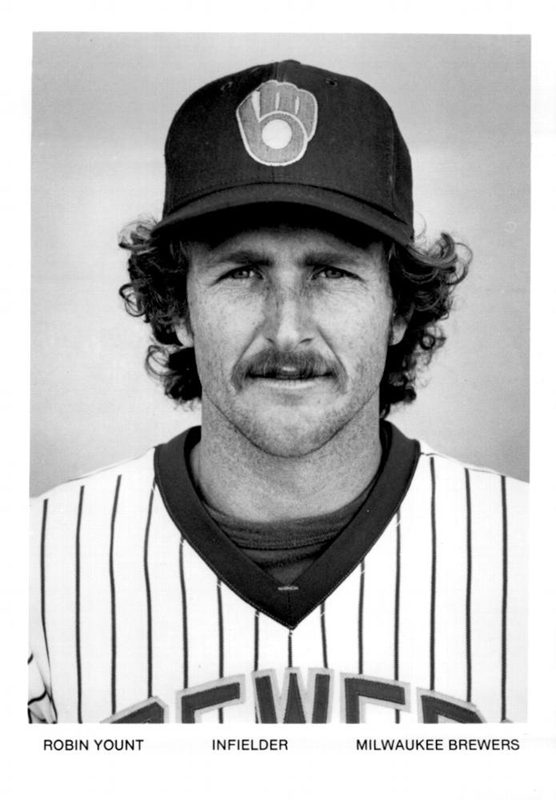 Robin Yount in the Brewers' pinstriped home pullover and ball-in-glove cap in a 1982 team portrait